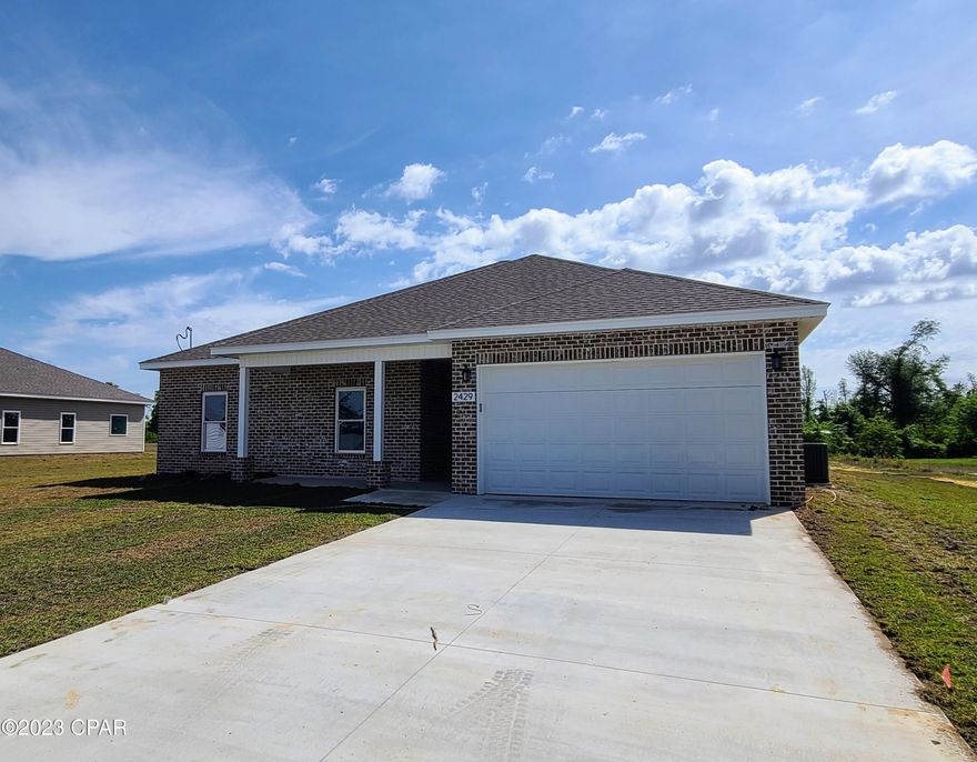 ''Currently under contract, seller accepting back up offers.''
New Construction on .6+ Acres in Lynn Haven, don't settle for living in a neighborhood where your home is built almost on top of your next door neighbors. This property is on a paved road with an entry to the Rails to Trails Project at the end of the road for your ease of enjoyment and access. Wait until you see inside these brand new homes in the highly desirable area close to shopping, entertainment and great schools. These homes have spared no expense when it comes to insurance savings from the impact rated windows/doors, peel and stick roof covering, full hip roofs and 2x6 exterior walls up to the newest codes. The interior features 4beds/2bath, split bed floor plans, quartz countertops throughout, soft close cabinets, LVP flooring, trey ceilings, recessed LED lighting and a stainless kitchen appliance package. The large patio door leads to a covered patio and humungous back yard. These under construction homes are almost ready to move in.