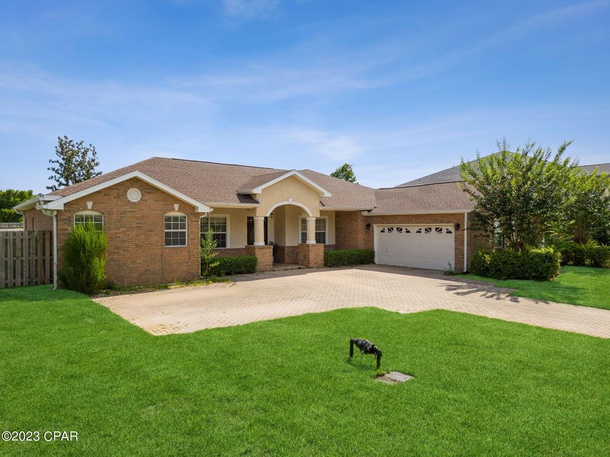 Don't miss out on this absolutely stunning home central to just about everything in town and located in a quiet neighborhood surrounded by a protected preserve. Convenient to Navy and Air Force bases, both Hospitals, shopping centers and beautiful emerald beaches. Located in Lynn Haven, this beautiful home features 10ft ceilings, 4 bedrooms, 3 full baths + an office, and inground swimming pool. When you enter the home, you will be greeted with the formal living room, a formal dining room and an office with beautiful built in wood shelving. As you continue down the hall you will find the spacious master suite that offers two walk-in closets, dual vanity, garden tub, a separate shower and a makeup vanity. On the opposite side of the home, you will find two other spare bedrooms with a Jack & Jill bathroom and the laundry room with a sink (washer and dryer convey). The third bedroom has its own entrance, perfect for older children, or as an option for other family members.   the kitchen features a breakfast bar, granite countertops, stainless appliances, and eat- in area with bay windows. Schedule your private showing today! All sizes/measurements are approximate; please verify if important.