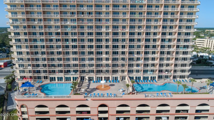 CURRENTLY UNDER CONTRACT, SELLER ACCEPTING BACKUP OFFERS. It is rare that a corner unit becomes available. With over 1500 sq. ft., this feels like a home.  The wrap around balcony offers incredible views and sunsets of the Gulf.  The condo offers 3 Bedrooms/3 Full Baths with the ease of tile flooring and is very well appointed.  The kitchen features a large breakfast bar with seating for 4 along with a separate dining area. The massive couch is awesome for relaxing after a long day of activities.  You have incredible views of the Gulf from the kitchen, dining room, family room and the master suite. You are walking distance to a number of restaurants & only a mile to Pier Park for your shopping and dining pleasures.  A snowbird is already on the books & this needs to be honored!