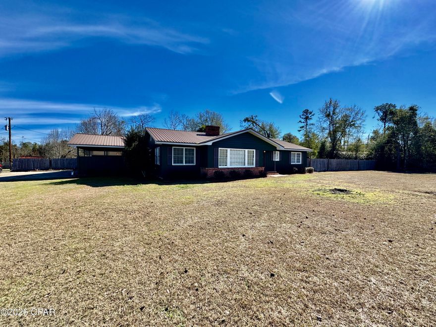 Renovated, spacious, and full of charm—this exceptional 4-bedroom, 4-bath home offers 3,092 square feet of comfortable living on 2.2 beautiful acres in Blountstown, Florida. Enjoy the best of small-town living with room to breathe, great neighbors, and no HOA. This move-in-ready home features a durable metal roof, original hardwood floors, and a thoughtfully updated interior that blends character with modern convenience. The large yard is partially fenced, offering endless possibilities for outdoor living, pets, or gardening. A generous back porch provides the perfect space for entertaining or relaxing while enjoying the peaceful surroundings. Plenty of land, privacy, and space inside and out. Conveniently located—not far from the Gulf beaches and within easy reach of Tallahassee. A rare opportunity to own a large, renovated home with acreage and a true small-town feel.