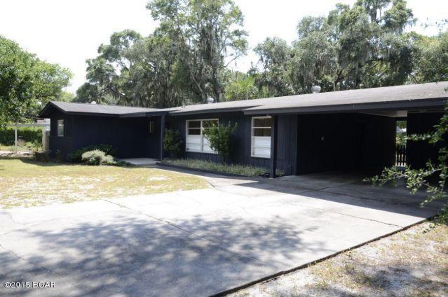 Cove living at its best. A block off of the bay, a few blocks from the yacht club, and biking distance to downtown, this newly renovated mid-century home with an open floor plan, hardwood floors and fenced back yard is perfect for a family.With three bedrooms, two baths (plus an outdoor shower), an office adjacent to the kitchen, a dining area, a living area, a screened Florida room and a conditioned detached room that can be used as an office or for storage, it provides plenty of space and comfort.Custom made "bottom up" blinds let light spill through the whole home while protecting your privacy.Your family can sit at the rolling island next to the kitchen while dinner is being prepared. It's perfect for eating breakfast or a quick bite.