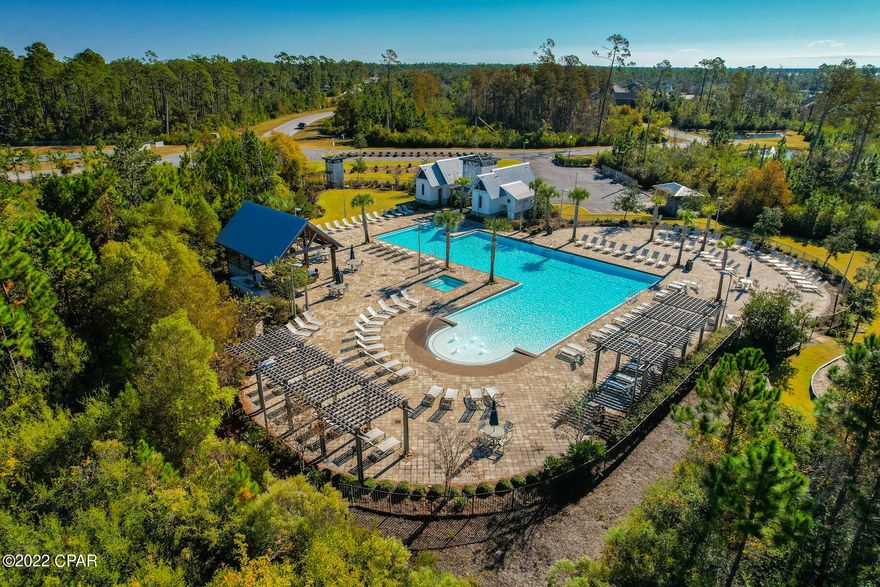 SELLER IS OFFERING $5000. TOWARDS BUYER'S CLOSING COSTS! This Fanning Bayou 5 bedroom Elle floor plan has plenty of space for a large family or extra rooms for craft and office work. It has two living areas, an open concept eat in kitchen, a master suite on the first floor that includes double vanities, a garden tub and a separate shower. This neighborhood has an amazing entrance with a waterfall , a huge community pool and recreational area and well kept landscaping throughout. Just a short drive to Panama City Beach and Pier Park! Call today to tour your future home!