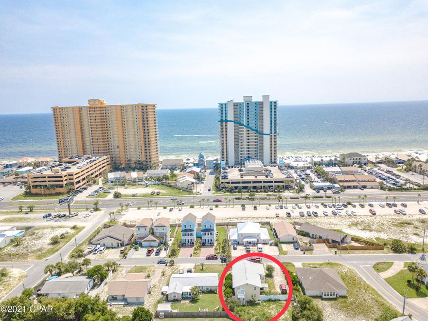 CURRENTLY UNDER CONTRACT, SELLER ACCEPTING BACKUP OFFERS' 

QUIET EAST-end location of Panama City Beach on  the FIRST BLOCK off of Thomas Drive ACROSS from the SUGAR SHORE and EMERALD waters....the perfect combination in a DUPLEX: each floor is complete with 2/2, kitchen, dining, SUNROOM, PLUS WRAP AROUND DECK upstairs. Current use is with long-term renters in place bringing total $3200/mo. ..Future use? Yours to decide: live downstairs and lease the upstairs for long or SHORT TERM, OR SHORT TERM BOTH UNITS. NO HOA! Large FENCED yard; room for the POOL. LARGE DRIVEWAY can accommodate RV or BOAT...Dolphin Dr BOAT RAMP nearby. Recent improvements include new roof, paint, kitchen cabinets, counters, floors....