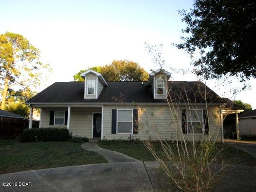 IMMACULATE HOME IN LYNN HAVEN!  This home has been freshly painted and features include new granite counters,  stainless steel appliances and under-mount sink with pull down faucet in the kitchen; spacious living area with laminate wood floors throughout the living areas, including the Master bedroom; a large Master bath with garden tub, separate shower and walk-in closet; and a second bedroom with new carpeting.  Outside you will find a covered carport and a yard building for additional storage.  This home is ''turn-key'' ready and priced to sell!