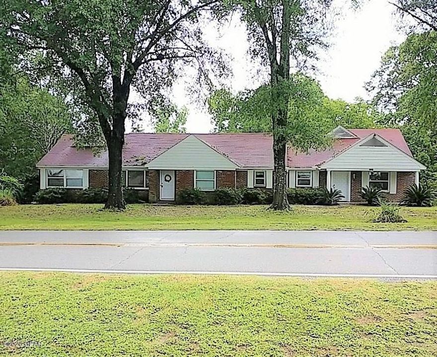 Beautiful brick home on 2 acres with an enclosed in-ground pool and a separate apartment on the premises.  The main house consists of 3 bedrooms and 3 baths and is very spacious with 3958 square feet.  Large kitchen with cooktop, double ovens, and a dishwasher as well as a separate dining area.  Two separate living areas and a game room.  The master suite includes a large bedroom, attached full bath, and an entire room for a closet.  There are 2 bedrooms downstairs and one upstairs.  The 400 square foot apartment has 1 bedroom and 1 bath.   Enclosed pool house with huge pool and a hot tub.  Attached 1-car garage. Circular driveway leads to the house and the apartment and has paved road frontage. There is also a nice barn for all of your projects. Seller will consider cash buyers.