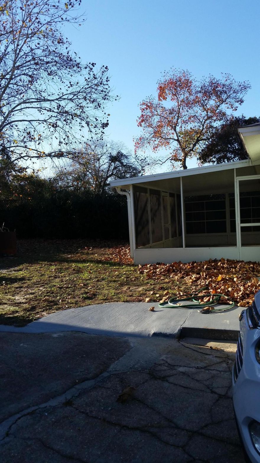 This nicely kept 3 bedroom and 2 complete handicapped accessible bathrooms on a large lot with a 1 car detached garage. Home is concrete block with stucco covering. Crown molding adds a nice touch to to living room. Automatic hurricane shutters and a back-up generator.  Wired for hot tub. Ride your golf cart to the beach.