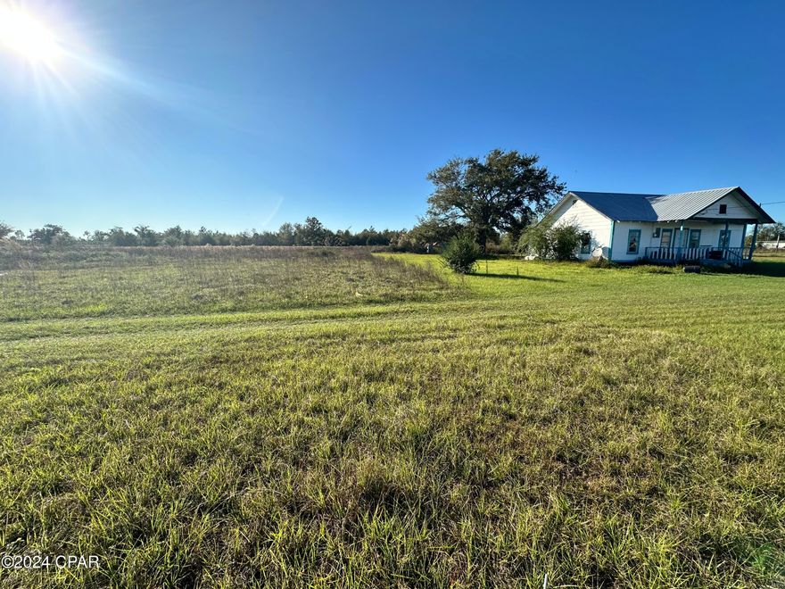 This 11.5 acres is a perfect location for a homesites or add rentals back to the property. There are 5 septic tanks, 2 wells and 5 power poles already on site. There is only 1 home currently on the property and it is vacant. Directly across the street is a very nice subdivision that is fairly new and has a lot of new construction.