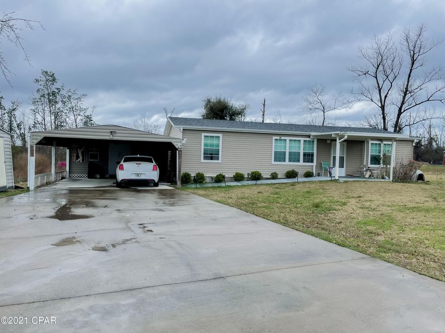 Check out this adorable 2013 Double Wide, with lots of great features. The home sits on a large lot with 4 storage sheds, a carport and a cozy backyard. The home features an open floor plan with a split bedroom floor plan, and a wheelchair accessible sidewalk ramp. The home is on a quiet paved road. Only a short distance to town, and within minutes of HG Harders Recreation Park. On a Well and Septic. New Roof in 2019 and New outside HVAC unit.