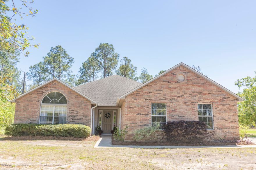 What a deal! Beautiful home on close to an acre just down the street from Deane Bozeman, the ''A'' rated school! As you walk into the home you'll immediately notice the open floor plan and large living room with a real wood burning fire place. This open space has plenty of room for a sectional, couch & love seat and some relaxing recliners. There's also a space you can make a formal dining room or an office! As you move into the kitchen, you'll see the spacious eat-in dining area w/french doors leading out to the screened in Florida Room. Plenty of cabinets and newer appliances grace this spacious kitchen. There's also a nice size pantry. All rooms are generous in size and the master bedroom has his and hers  separate closets. Bring your toys, there's plenty of room to park a boat or RV!