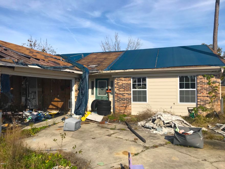 AMAZING fix & flip or investment opportunity with this 3 Bedroom / 2 Bathroom brick home in the King Estates neighborhood of Panama City! This home is 1,524 sqft. (heated) and 2,207 sqft. (total). As you can see, the home was damaged by Hurricane Michael and will require repairs - including roof, some masonry, etc.; But the majority of damage was isolated to the garage, so the interior of the home is in pretty good shape! AT THIS PRICE THIS PROPERTY IS A STEAL! And it definitely WILL NOT LAST LONG, so act quickly! --- CASH BUYERS ONLY ---