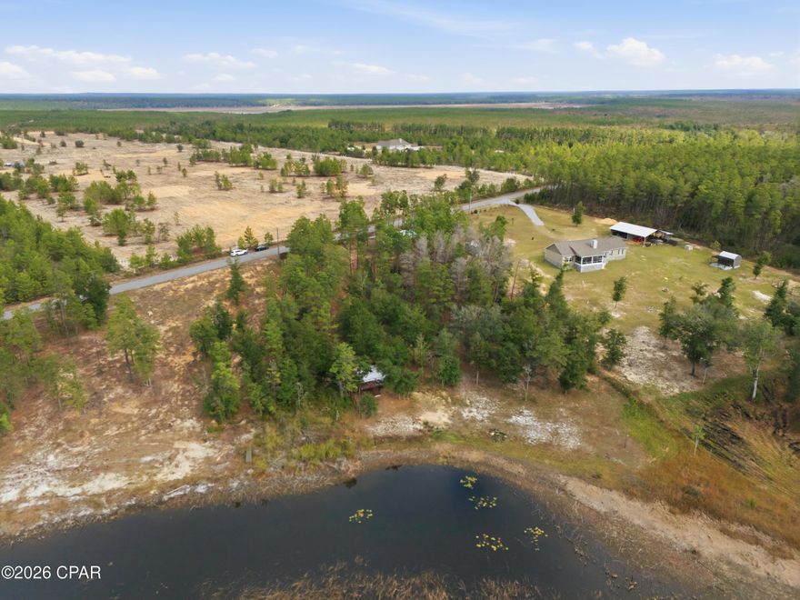 Escape the noise of the city and discover the rare opportunity to own 5 breathtaking acres of private lakefront land, where peace, privacy, and possibility come together. Whether you're envisioning a custom dream home, a serene weekend getaway, or a long-term investment in quality of life, this property is ready to bring your vision to life.

With direct lake access, you can enjoy fishing, kayaking, paddleboarding, or quiet mornings watching the water shimmer—all from your own backyard. The land offers a beautiful balance of open, usable space and natural wooded areas, creating both versatility and seclusion in a truly picturesque setting.

Adding tremendous value, the property is already improved with a 30 x 48 pole barn, an existing well, and a power meter on site, saving you time, money, and the stress of starting from raw land. Whether you need storage, a workshop, or a base while you build, the infrastructure is already in place.

This is the kind of property that's becoming increasingly difficult to find—private, lakefront, usable acreage with utilities and improvements already completed. If you've been searching for a place where you can slow down, reconnect with nature, and create something truly special, this land offers an unbeatable opportunity just outside the city.