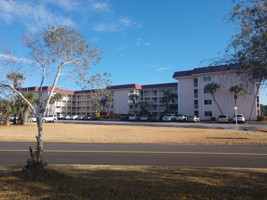 Enjoy the location, golf course view, 

enclosed porch, pretty floors, and updated bathrooms. You are 5 minutes from Pier Park by car AND who doesn't love a ground floor unit for carrying packages inside?