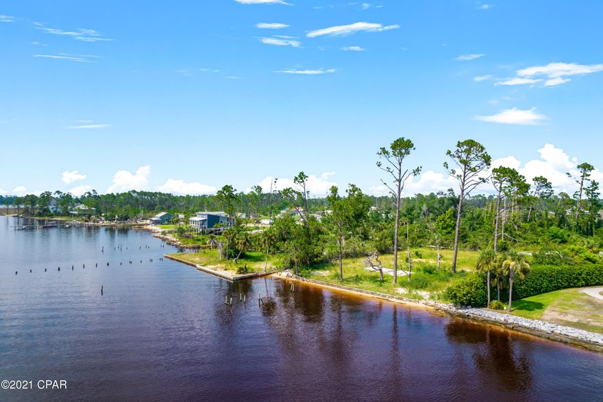 There is NO better value in Bay County! 

Here is your MILLION dollar view without the million dollar price tag!! 114' of waterfront property on North Bay providing access to the Gulf of Mexico!  Over 1/2 acre to build on - NO wetlands! Includes your very own boat ramp!  Space to build your dream waterfront retreat, add a dock for fishing, boating or swimming, private sandy beach for catching some rays! Enjoy priceless sunsets every night & view holiday fireworks celebrations over North Bay from the comfort of your own haven! Just over the Bailey Bridge from Lynn Haven!  All this within minutes of Lynn Haven/Panama City, shopping & convenient to PCB as well!  Comes with the .11 acre lot across the street on the corner of Marvin Ln & Marina Bay Dr.  NO HOA!!