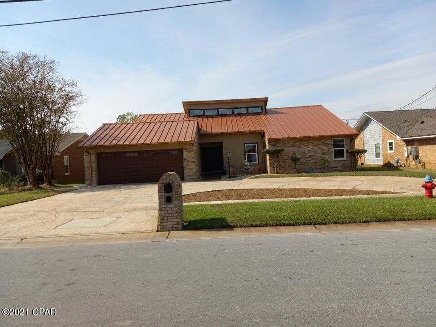 'CURRENTLY UNDER CONTRACT, SELLER ACCEPTING BACKUP OFFERS'

Enjoy making special memories in this amazing backyard oasis featuring a covered, solar heated pool with mature landscaping and a large deck for entertaining family and friends.  An all brick, contemporary style residence in the highly desirable Forest Park area offering a spacious great room with vaulted ceiling and an electric fireplace, circular driveway, large bedrooms, new Kitchen Aid stainless appliances, 2 food pantries, a sizeable laundry room and an out building/workshop. Upgrades include: commercial grade metal roof w/seamless gutters; double paned, hurricane impact windows and doors; tank less hot water heater; hardwood flooring; pool recently re-plastered, new pumps and solar panels; enlarged wood deck; impact garage door with a Lift Master smart opener; commercial grade fuse boxes; ceiling fans, can lights, light switches, outlets; interior doors, trim, crown molding; freshly painted interior walls.  Schedule now to see for yourself. Buyer to verify all information and dimensions, if important.