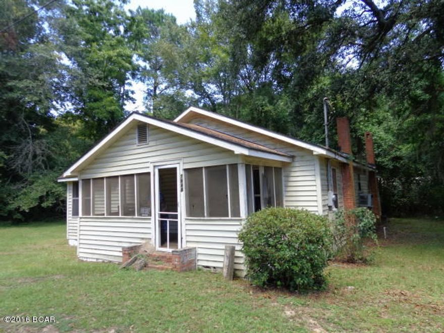 Old wood frame home in the City Limits of Sneads.  Investment project. Fix up and lease or fix up and enjoy. There is an extra room that was used as a bedroom but there is no closet. Paved city road. City utilities. Being sold as is.