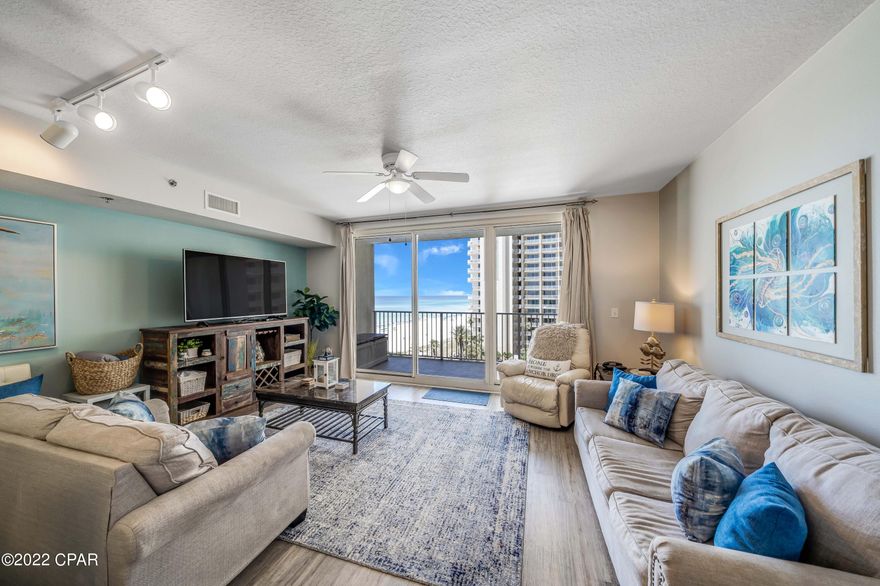 CURRENTLY UNDER CONTRACT, SELLER WILL CONSIDER BACKUP OFFERS' Welcome to this 7th floor move in and rental ready condo with Sunset views! Park in your highly sought after same level, deeded parking space so you can unload and walk to #727, no elevators needed! Upon opening the door, imagine yourself taking in the view of the emerald waters of The Gulf and the sugar-white sand that is unique to the Emerald Coast of Florida. This one bedroom (w/King) condo has a separate Bunk Room, two baths and is 936 sq ft.  It is offered fully furnished with a well-equipped kitchen, beach items and more.  Updates include the removal of carpet and replacing with LVP, stainless appliances, a stacked washer and dryer and tasteful beach decor. The resort amenities feature a 14,000 sq ft Gulfside pool, hot tub fitness center, tiki bars and on-site food choices.
