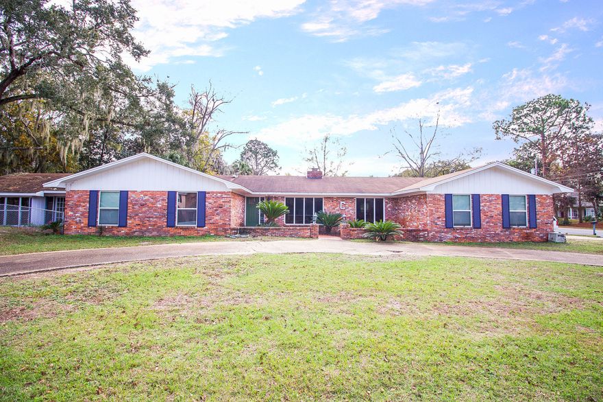 Very spacious home in the desirable neighborhood of Northshore featuring an enclosed HEATED POOL!! This home sits on almost a 1/2 acre lot and features an enclosed heated pool, living room with a cozy wood burning fireplace, formal living room, dining room, and a family room, as well as a florida room. The home also features laminate hardwood flooring, a large kitchen with lots of cabinets and a breakfast bar, and a large walk in pantry. This home has so much to offer! A bonus room has been added to the heated and cooled square footage, and the master bedroom is a split bedroom that includes walk in closets & double vanity. The fourth bedroom has been converted into an office and leads out to the enclosed pool with over 1,272 Sq Ft of enclosed area. Would be great for kids & entertainment Double garage carport, and lots of space for an RV or boat. No flood insurance required & no city taxes. Also, every light bulb in house was replaced with LED bulbs for cost efficiency. Make your appointment today! All sizes are approximate.  Please verify all measurements as these are estimates.