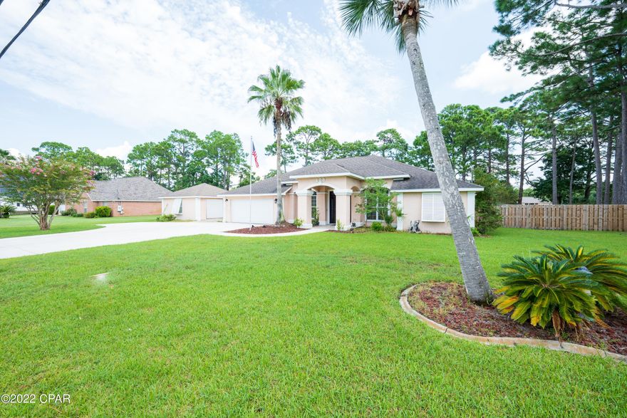 This Colony Club Pool Home is located on one of the larger lots, which it's a lot and a half. This four-bedroom, three full-bath home features a screened-in saltwater pool overlooking a wooded section of the golf course. There is a detached single garage/workshop and a two-car attached garage. Inside, you will find an office den, dining room, breakfast room, open kitchen, and living room, all with high ceilings. The split floor plan has the master on one side and three bedrooms on the other. The fourth bedroom has a private entrance and ensuite, which would be perfect for guests or in-laws. This home features surround sound inside the home and around the pool. The house is technically outside the neighborhood, so there are no HOA dues or rules. The home also comes with a full house generator which has a plug installed on the back area of the home.There is plenty of parking for a boat or RV with a pad site complete with a power and sewer pump-out line. Rarely will you find this set up so close to the beach? The home is freshly painted inside, along with a new privacy fence on each side of the property.