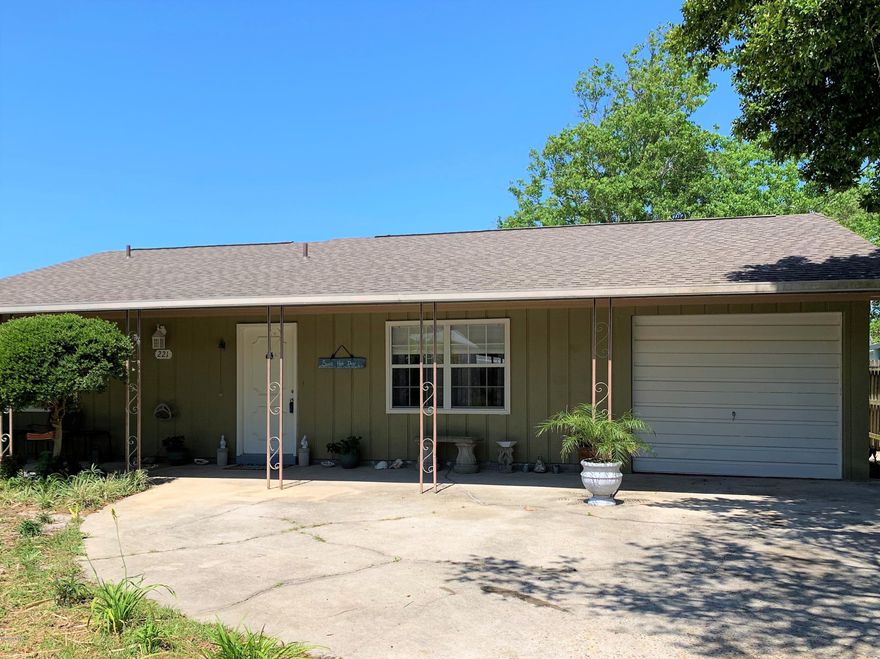 Beach home with two large bedrooms and two full bathrooms for 2293sf under roof on a huge 60x120 lot septic in front means pool could be put in the back .  A finished garage, interior storage, and enclosed climate controlled back porch for 1464 heated and cooled square feet in all make this a smart buy.  You can hear the surf when it is up, you can see the water when you depart the home for a very short stroll to the beach with two accesse sgive you easy walk over to the white sand and  emerald green water of the favored Laguna Beach.  Golf cart friendly community near the Carousel, Thomas Donuts, Rosemary and 30a, Pier Park and more.  Owner keeps the home in excellent condition, move in ready, also close to 2 churches so hardly any street noise and safe area. Short term rentals allowed. Points to note:  New roof in 1/2019,new outlets, lights and switches, blinds, window treatment and more... new Whirlpool washer/dryer included; the hvac ducts professionally cleaned in 2019. Misc yard equip, mower etc in garage will remain, and some other misc tools shall convey and are of no value to purchase/sale price. Furnishings negotiable, all window treatment will stay, some furniture will stay, some can be requested, please inquire about it, shall have no contributory value to sale price. RV area, if you wish to park an RV, you are not restricted in this location.  Golf Cart community, you will not want to miss out on the many Golf Cart Parades throughout the year!  Dedicated Beaches associated with this area, so you will always be able to access the World's Most Beautiful Beaches! Seller offers allowance with full price offer of $500 to Buyer at closing.  Garage has extra room for all of your bikes, toys and projects plus still room to park!  Auto Garage door may or may not work, sold as is.  Easy maintenance home and yard, as the maintenance and upkeep are in very good standing.  The bedrooms are overly large compared to even newer homes! Front porch to play on! Two churches in the area make the resident count low, this helps with crowding on beaches, other than church events it is very very quiet.  Peek a boo view of the Gulf water's all the way down the street.  Home was remodeled in 2010, as the Effective Date Built on record with the County Assessor office.  Bonus areas included under roof are enclosed rear porch, storage and laundry area off garage are heated and cooled but excluded from the sf noted at the appraiser's site. Laguna Beach has an optional Homeowner's Association for the Dedicated Beach protection and taxes for only $50/yr OPTIONAL.  Dont let this gem pass you buy, it is easy to show and you will not be disappointed.