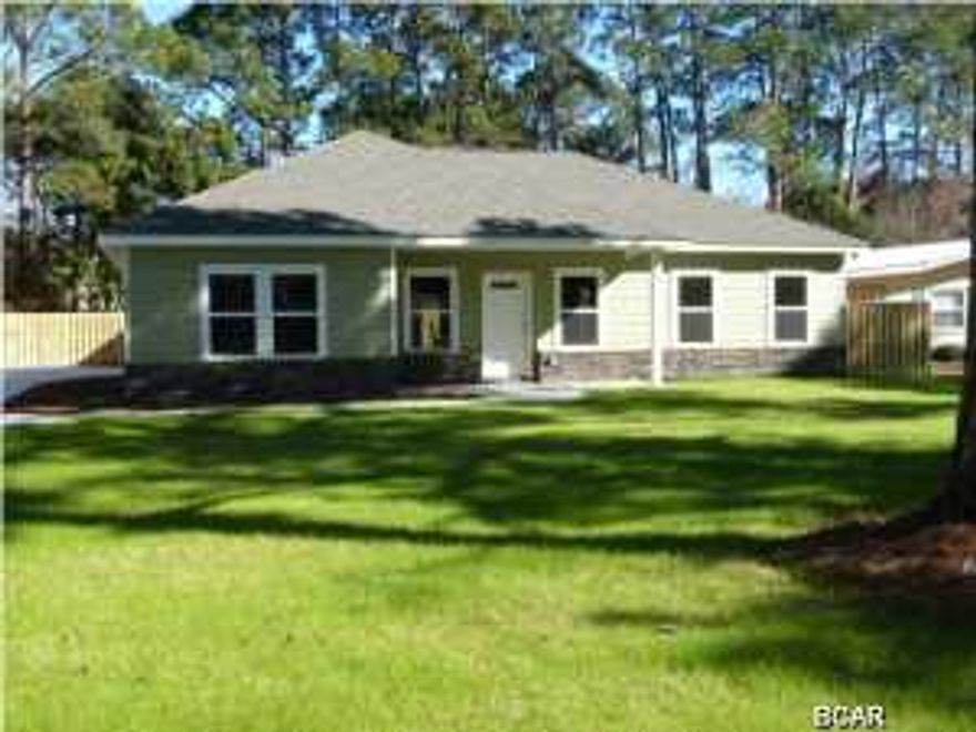 Seller will pay $2,500 toward Buyers closing costs!!! Here is your opportunity to be in your brand new 3 bedroom 2 bath single story home situated on a 75' x 190' lot located in the heart of Panama City Beach. You are minutes away from the Navy base, shopping, entertainment and the beach in time for the holidays. This home features over 1,500 square feet of heated and cooled living space. All of the bedrooms have plush upgraded carpet, all of the other areas have porcelain tile. The master bedroom features a nice oversized walk-in closet. The master bath has double vanities and a large walk in shower. All of the kitchen appliances, including the refrigerator are stainless steel and the countertops are a beautiful warm granite. All of the exterior walls were constructed with 2x6's and
