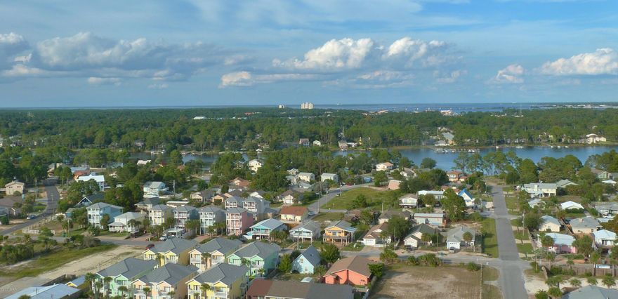 This is an awesome lot. You are right next to the boat ramp, and you can walk to the beach. If you are a boater, fisherman, kayaker, or paddleboarder this is the spot for you. This seller has multiple lots for sale that can be joined together. Build a compound, or you own little oasis, or build a rental. There is plenty of room on this lot to put a pool. All information should be verified by the buyer.