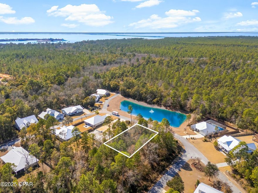 Located right across the street from the water, Lot 53 Hibernate Way, provides an excellent opportunity to own in one of Florida's premier neighborhoods. Nestled along Florida's Emerald Coast, right over the 331 bridge, Bear Creek is a scenic gated community that makes owning paradise a reality. Residents enjoy pickleball, tennis, a pool, a playground, and a fitness center.

A resort-style pool and additional pickleball courts are coming in Phase 3's amenities center, which is currently under construction. Bear Creek's slogan is ''Closer To Everything', and location is its best asset. It is conveniently located minutes from beaches, major highways, bayfront parks, boat ramps, docks, public fishing piers, and waterfront dining. Bear Creek is a short drive from the international airport & charming coastal towns on Scenic Hwy 30a. Bear Creek ensures the amenities are for residents only by banning vacation rentals.