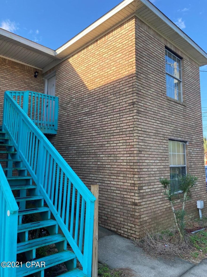 Location is king with this unit!  Located 2 blocks from Beach Access 45 leading to the  white sands of the Gulf of Mexico. This 1 bedroom 1 bath second level unit features all new tile floors, new granite counter tops, new cabinets and all new appliances.  In unit laundry hook up and balcony/patio off of the living room.