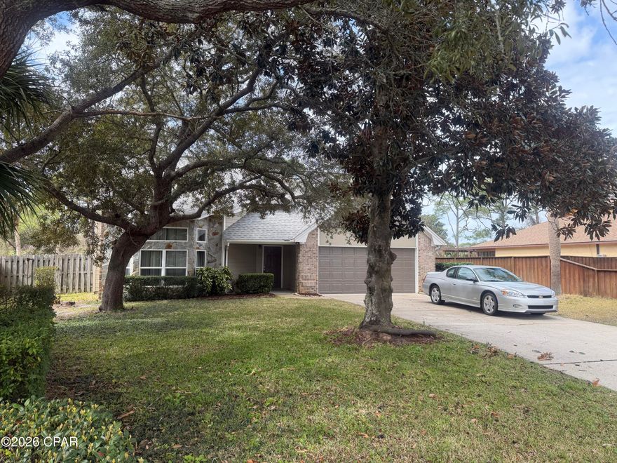 Spacious Two-Story Home with Vaulted Ceilings & Flexible Living Areas

This well-designed two-story home offers generous living space, vaulted ceilings, and multiple flexible areas to suit a variety of needs. The welcoming living room features soaring ceilings, abundant natural light, and an open staircase that adds architectural interest.
The kitchen includes ample cabinetry, a pantry closet, tile flooring, a dishwasher, electric range, and a large window over the sink providing natural light.
 An adjacent dining area offers convenient access to the backyard through French doors. Also, just off the kitchen is a formal dining room great space for those Holiday dinners.
The primary bedroom is located on the main level and features a spacious layout, large closet with mirrored doors, and en-suite bath with vanity, dressing area and tub/shower combination. An additional full bathroom serves the remaining bedrooms on the 2nd level.
Upstairs, you'll find 3 additional bedrooms and flexible loft-style space overlooking the main living area--ideal for a desk and computer space.
Exterior features include a two-car garage, extended driveway, large, fenced backyard, patio space, and mature trees providing shade and privacy.
List of most recent improvements:
*Roof replaced 2021
*HVAC 2025
*Hot Water heater 2023
*Impact windows in front, newer windows on 2nd floor with shutters.
Conveniently located near shopping, dining, and local amenities.