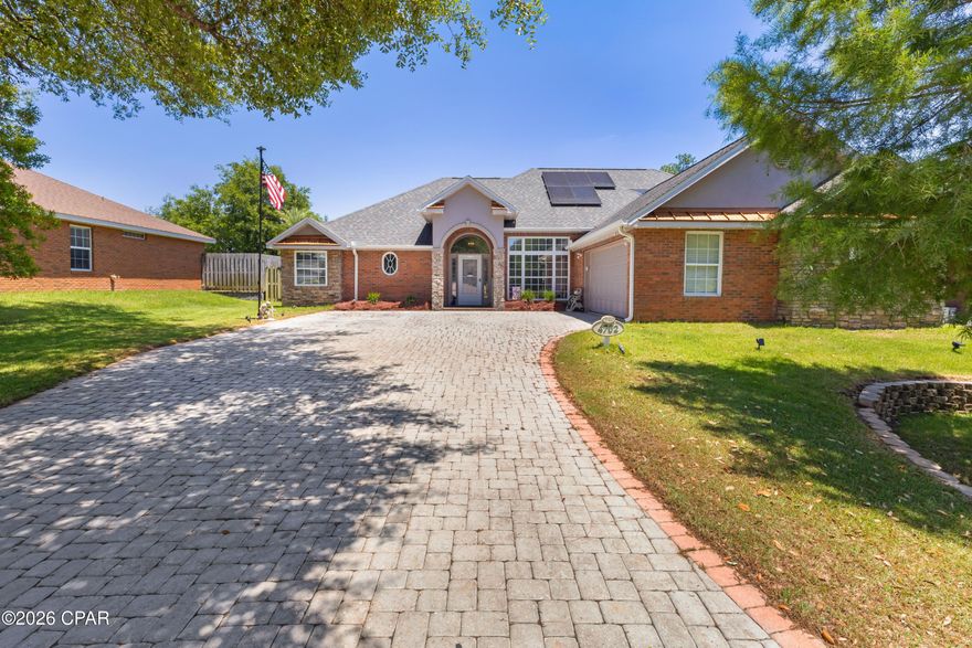 Welcome to Grant's Mill in Lynn Haven! This beautifully updated and well cared for 4-bedroom, 2-bath home offers approx. 2,281 square feet with many great hard to find features. One of the biggest highlights is the solar panel system (paid off by seller at closing), helping provide extremely low power bills - be sure to check the document section for details on the impressive savings! This home has fantastic curb appeal that makes it stand out from the moment you arrive. Inside you'll find numerous upgrades throughout. As you enter the home, the living room features custom built-in cabinets and a stacked stone fireplace. This home offers a split floor plan with the master bedroom on one side of the home and three additional bedrooms on the other side with one on the second floor. Step outside in the backyard and enjoy your own private oasis complete with a recently resurfaced in-ground gunite pool, covered patio, mature trees, and a fenced backyard for added privacy and security for pets and children. The home also includes custom exterior Govee lighting, allowing you to customize holiday and accent lighting year-round right from your fingertips - no more hanging lights every season! Location is another bonus, with Lindsay Crossing just minutes away offering restaurants, shopping, gas stations, and a supermarket all less than five minutes away. Outdoor lovers will appreciate being approx. ten minutes from the 99-acre Lynn Haven Bayou Park and Preserve, and the home is also conveniently located near North Bay Haven Charter Academy and Mosley High School. As an added bonus, the property comes with an existing survey. This home truly checks all the boxes - don't miss your opportunity to own this incredible property in one of Lynn Haven's most desirable areas! All measurements are approximate; please verify if important.

Additional Upgrades/Features:
• Solar panels - 2023 (paid off at closing) see utility bill in doc section
• In-ground gunite pool resurfaced in 2024 with new lighting and wiring
• New pool pump and filter (2025)
• Exterior Govee lighting system - holiday/accent lighting (2025)
• New flooring throughout most of the home (2024-2025)
• Entire interior repainted (2025)
• Exterior repainted (2025)
• New stove, dishwasher, and microwave
• App-controlled sprinkler system
• Additional garage lighting added (2025)
- Transferable Termite Bond - Brocks
- Securtiy System/Cameras convey