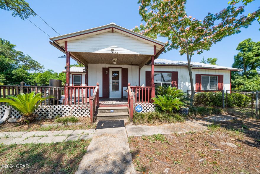 Spacious 'As Is' home nestled on an expansive land parcel spanning five lots. This property offers endless potential for renovation or redevelopment in a serene residential setting. With ample room to customize and expand, it presents a unique opportunity for investors or buyers seeking to create their dream home in a desirable location.