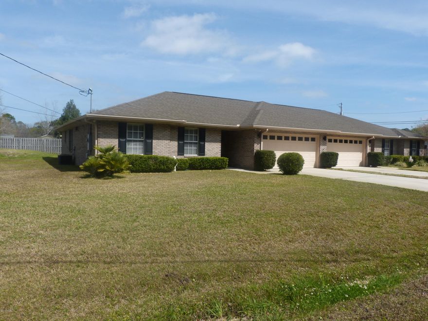 This is actually the right side of a duplex but has the feel of a stand alone home. Great rental investment. Units are connected by garage.  Lot size for this half is 105x119.(see MLS #643714 for the left side which is 2635 39th Street). Can be sold individually or together. Both sides have identical floor plans built so family members could live close to one another.  This immaculate house is a must see to appreciate all the extras including laminate floors, crown molding, surround sound, fireplace, large fenced in corner lot, storage building, two car garage, 30 amp plug for a camper and concrete carport area perfect for storing a boat or camper. Well water on both houses. Home Warranty. Age, sq. ft., lot and room sizes approx.  Please verify if important.