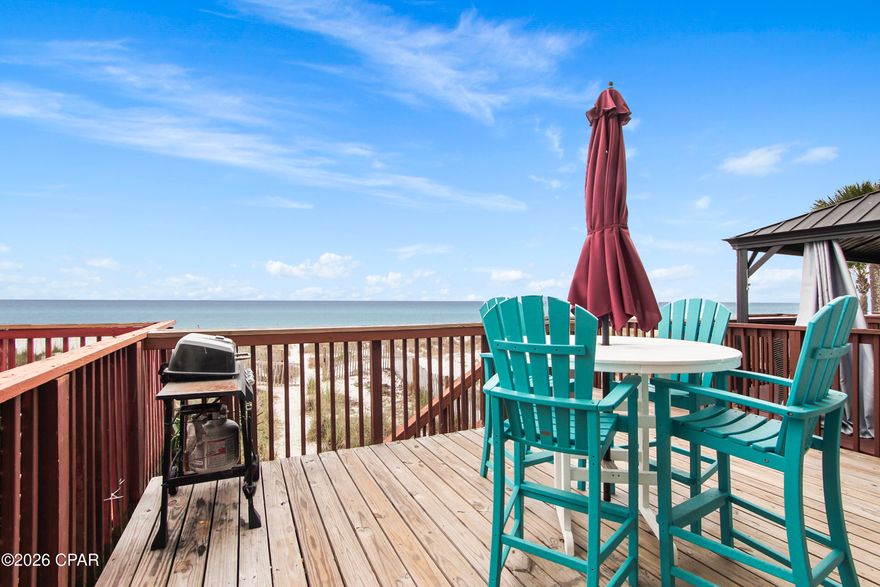 GROSS RENTALS OVER $100,000 IN 2025.   This townhouse has 10' ceilings in the living room giving it a very open feel.   Large deck GULF FRONT with private walk way to the beach.    Located at the intersection of Hwy 79 and Front Beach Road.   This is a BEACH-FRONT TOWNHOUSE WITH NO HOA DUES.   Master bedroom is GULF-FRONT.    Lots of updates throughout, including bathrooms and flooring.   3 full bedrooms, 3 full bathrooms.
