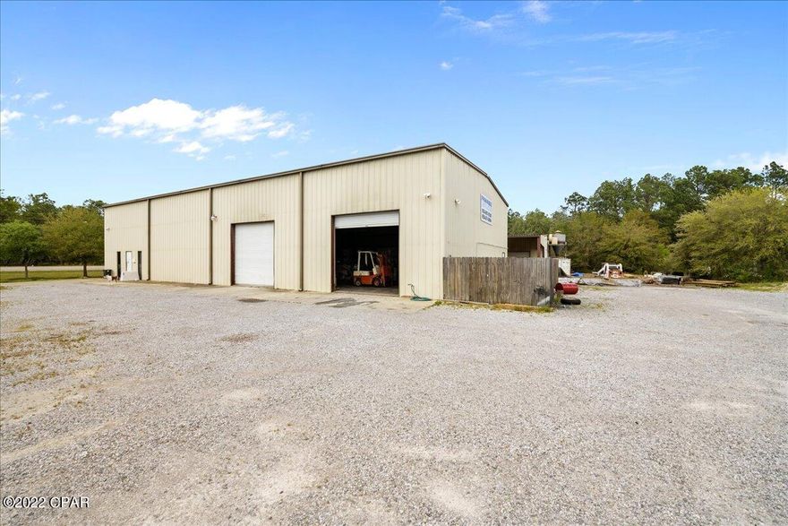 Under Contract Accepting Back Up Offers During Feasibility Study Period- Hwy 331 Road Frontage- Nearly 1 Acre of Light Industrial Zoned Property with 5000 sqft of Warehouse space & Office Space- loft area for additional storage & half bath in warehouse PLUS a large separate Apartment! Space to live and work in Freeport. approx 1500 sq. ft 3 Bedroom 1 Full Bath nicely finished apartment featuring a Living room, large kitchen with all appliances, dining area, laundry room & 2 Flex rooms which could be additional bedrooms, storage or office space. You must see this amazing property to fully appreciate. 20 ft ceilings in warehouse- 2 25ft roll up doors., office area and handicap accessible restroom on main floor, sky lights, almost an acre of property, large gravel parking pad, privacy fenced side area. End of building faces Business 331 with good visibility for advertisement of business. Industrial Court is County maintained, paved access road, city water and sewer and trash collection. Zoned light industrial. ***Verify Measurements if needed***