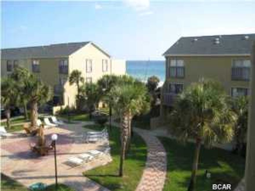 This is a great Gulf Front Complex and this condo has wonderful views... Relax from your living room balcony with great shade overlooking the community pool or on your bedroom balcony over looking the sunset on the gulf. It's located in the heart of Panama City Beach, within a mile of St. Andrews State Park, Schooners and Captain Anderson's Marina. This is a split level unit with smooth finished ceilings, new paint, an updated kitchen and baths. It includes a large private storage closet on the outside. A Great condo to use as your private retreat and/or for vacation rental income. **All important information must be verified.