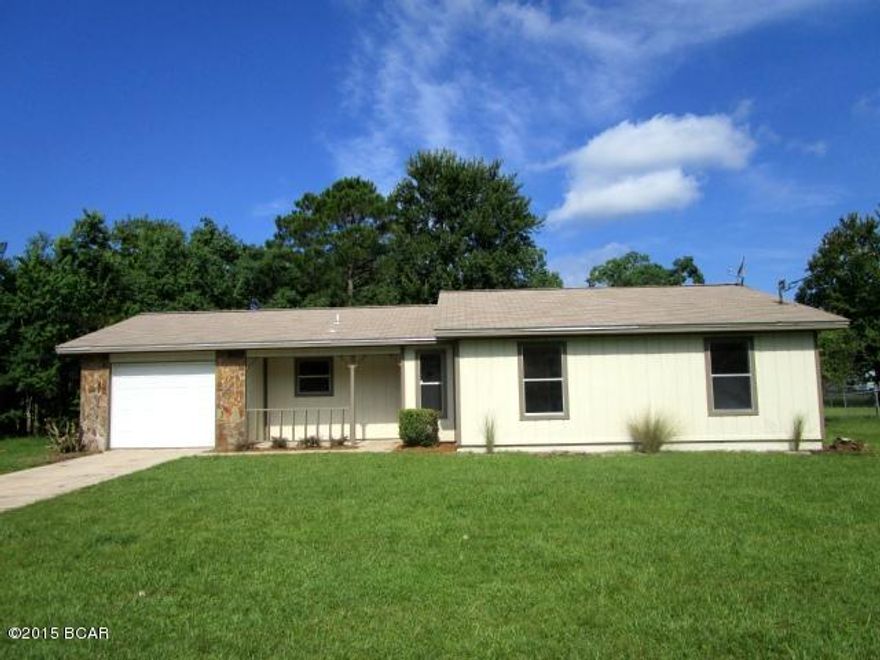 IF YOU ARE LOOKING FOR AN AFFORDABLE HOME THAT IS ''MOVE-IN READY,'' YOU HAVE FOUND IT!  This home features a spacious Great room with vaulted ceilings and new laminate flooring that includes the dining area as well.  The French doors in the Great room lead to the 12' x 20' covered patio that overlooks the fenced backyard with a yard building.   New carpeting has been installed in all three bedrooms, and the Master bedroom has a full bath and a walk-in closet.  A portion of the garage has been heated/cooled and turned into an office, hobby or utility room with a door that conveniently leads to the backyard.  The air conditioning system is brand new, the entire home has been freshly painted inside and out, and the home has a transferable termite bond.  Don't miss this one!