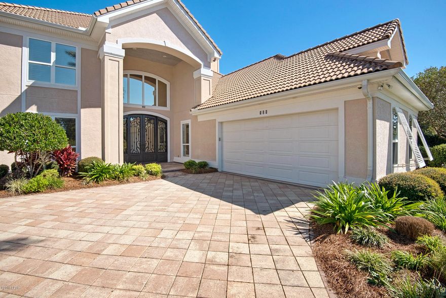 CURRENTLY UNDER CONTRACT, SELLER ACCEPTING BACKUP OFFERS. This stunning home is an absolute 'must see' if you're looking for elegant living with comfort and style. This home truly has it ALL.  Nestled on double lots overlooking the 9th hole of the only Jack Nicklaus Designed Golf Course in NW Florida, this homes setting, features and attention to detail are unmatched!  When visiting the property you will enter through a hand-crafted wrought iron  doorway. Once in the foyer, you'll enjoy the breathtaking view of the 20 ft. marble foyer and stairway with matching wrought iron railing that leads to the upper level bedrooms with a stunning view from the veranda overlooking the flawlessly manicured grounds, pool and Nicklaus course. This home also includes your very own amply spacious putting green with fringe, 6 hole layout, and 2- 7' x 5' chipping pads surrounded by a large beautifully landscaped yard with a high end Bermuda sodded lawn. (see photos)
On ground level is a large living room with coffer ceiling, a double fire place with granite hearth and fascia, dining room, library, office, breakfast area, wet bar with ice maker, large walk-in pantry, a separate butler's pantry, laundry room and kitchen. All counter surfaces throughout the house are granite and all cabinets custom made of maple. The kitchen has a gas 6 burner Viking stove with warming lights and 2 ovens, Viking double refrigerator, Viking built-in wine cooler, 2 Franke stainless steel sinks with garbage disposal, trash compactor, dish washer and sweeper system that is linked to the full house built in vacuum. The Master Suite is on ground level and has a foyer at it's entrance. It has a tray ceiling, flat screen TV, and gas fire place. Doors lead to the 60ft.x 15ft.covered patio with gas heated pool and spa. The Master Bath features an extra large/deep temperature controlled whirlpool Jacuzzi, glass tile walk-in double shower, separate toilet room, separate granite vanities, His/Her walk-in closets with custom fitted shelves and drawers that are panty hose proof, have felt lined drawers for jewelry, built in hampers with seating, cork flooring and have lockable and secret compartments for a safe. The office area has a custom built in desk and credenza with file cabinets all made of maple. On the second level are three bedrooms, two full size baths, one with a full size Jacuzzi, an entertainment area with wet bar, ice maker, convenient area for morning coffee for guests, and a beautiful large veranda overlooking the golf course and pool area. TVs stay with the house as well as washer and dryer, custom drapery, plantation shutters, and a built-in entertainment center with state of the art electronics. 6 areas have wall panel control for am/fm radio, CD, TV, DVD. The house HVAC system was replaced in 2013 and 2015. 2 instant-on hot water heaters. 125 gal for ground level and 75 for upper level. The bottom level outdoor area has been totally screened in with one double and two single doors also with totally weatherproof zippered canvas drop down covers to enjoy the area all year. The outdoor pool and spa are salt water chlorinated and gas heated with waterfall and state of the art Aqualink control panel in the Master bedroom that controls all features. The salt system is a commercial Kinetico which supplies rust free irrigation to the property. The yard features an in-ground pool, electrical outlets in all of the gardens, low voltage wiring throughout, backs up to the golf course and is enclosed with a 6 ft. iron fence with 4 in. spacers and 12 in. separators to keep children and pets safe. There is an Alarm system and alerts on all outside doors. There are security cameras throughout the inside and exterior of the home. A 2 car garage with golf cart entry and carpeted stairway to a bonus room above the garage. The house and garage offers an exceptional amount of finished storage. Located minutes from the beach, the bay and boasting a sprawling amount of entertainment space make this home an absolute must see! Sq. Ft., Room Dimensions, Tax information, or any important information must be verified by buyer if this is important. All measurements are approximate and should be verified. Some minor damage from the storm that is being repaired by owner. Roof is being replaced the week of 8/1/2019.