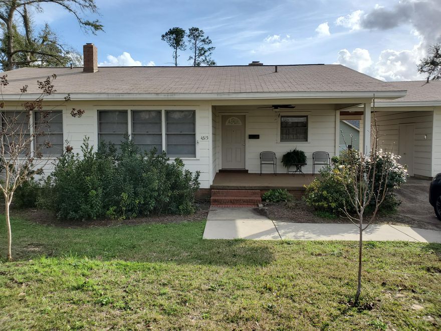 CHARMING HOME in Marianna!  This 3/2 home has some updates and is just beautiful!  Corner Lot close to shopping and and Riverside Elementary.  Beautiful hardwood floors and vinyl plank flooring in kitchen and dining.  Wood burning Fireplace with a beautiful mantel. Large Bathrooms with walk in shower in one and tub/shower in guest bath.  Lots of windows and natural lighting show off the beautiful colors in this home.  Newer appliances are part of this updated kitchen.  Come and enjoy the large covered front porch and the beautiful yard with large azaleas all around.