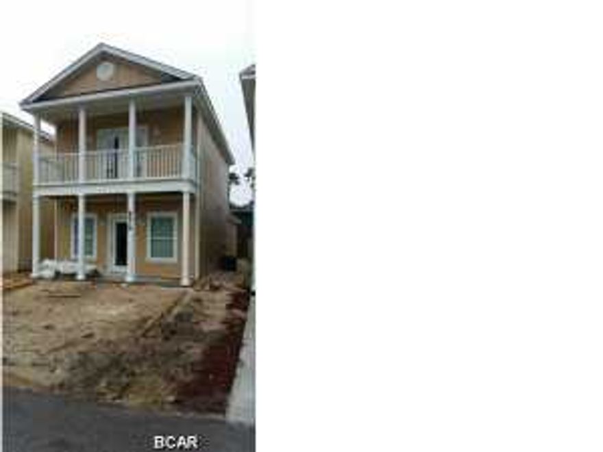 Fenced yard, deck and summer kitchen included! Charming Cottage style Brand New 2 story home in Gated community. Master bedroom on first floor. 3 Bedrooms/2 1/2 baths. Community pool in a 24 unit complex. Located very conveniently to the Navy Base, St. Andrews State Park and the worlds most beautiful beaches! This home is a most see. Master bedroom has its own full bath with full tile shower and glass shower door, and walk-in closet. Home features 9 foot ceilings, upgraded Fridgadaire Gallery Stainless appliances with side by side refrigerator, carerra marble countertops. Solid white shaker wood cabinets with glass door and crown molding. Each unit has a gated area for a large private storage space. Dead end street, Very close to beach and Front Beach Road. Home owners dues include