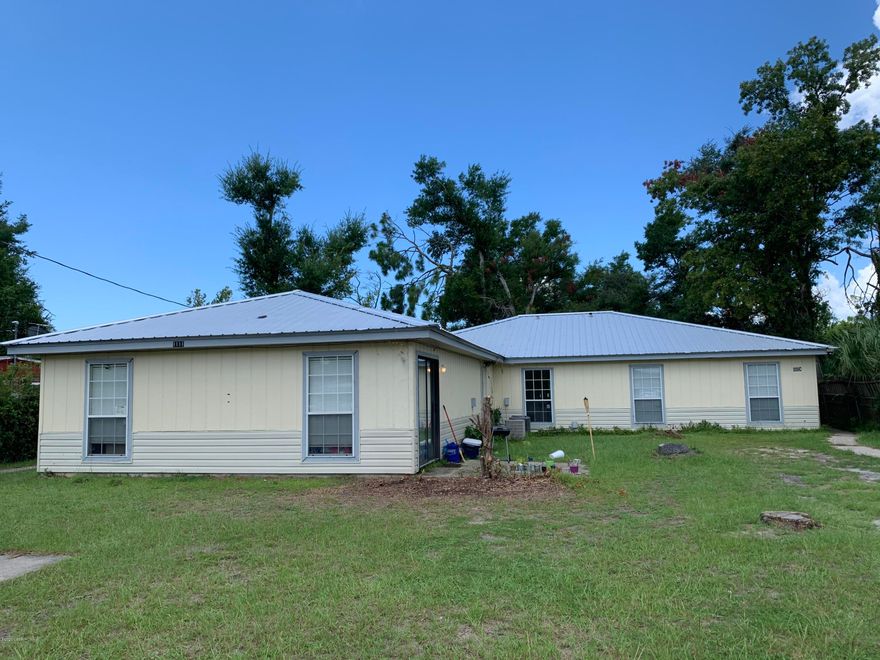 Great investment opportunity!  Triplex on quiet street in the St. Andrews Bay area - All units have the following features: 3 bedrooms and 1.5 baths, individual electric meter, off street parking space, sliding door and patio opening to a nice size yard for each tenant, washer and dryer hookups, new roof in 2019, new windows in 2020, and minor kitchen upgrades in each unit.  All three units are occupied, with long term tenants which are month to month and the third unit is a one year lease.  Please do not disturb tenants.  Interior of all units can be shown with 48 hour notice and by appointment only.  Walking distance to the Oakland Terrace ball park and playground, or a nice public beach on the beautiful St. Andrews Bay.