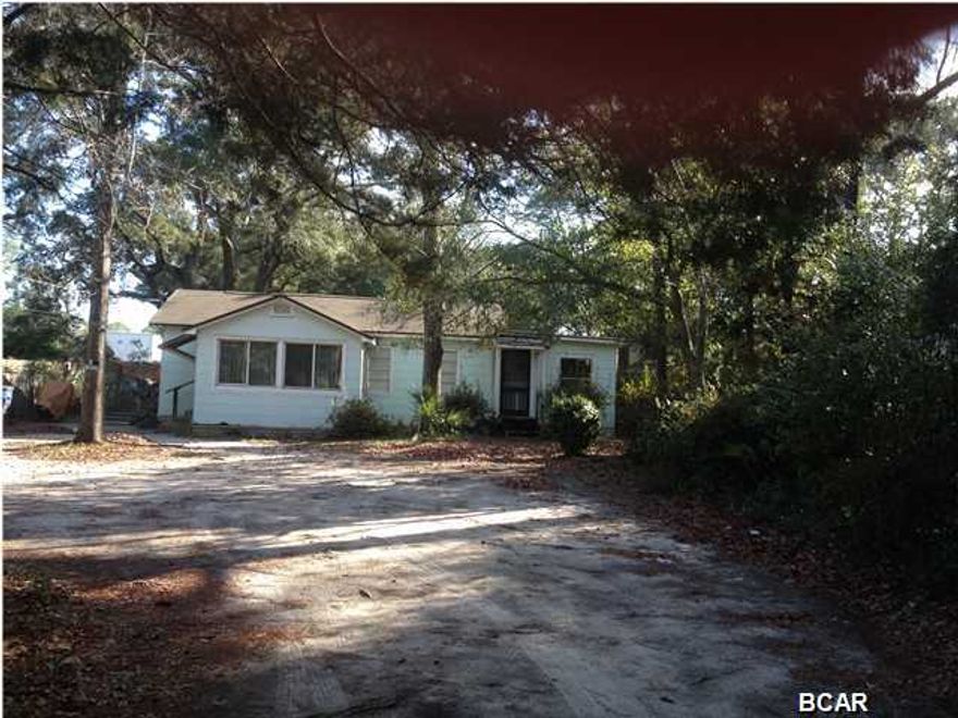 Great rental investment and location. Large lot and new roof.