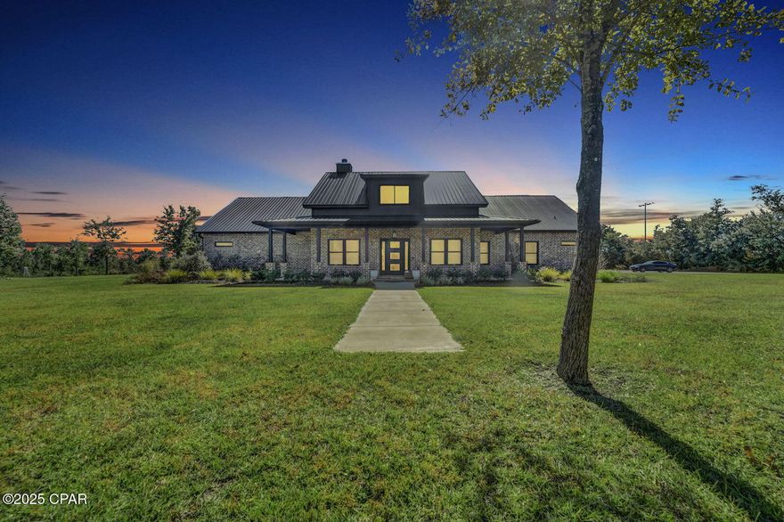 Stunning Hunter's Retreat - Outdoor Paradise Awaits!

Welcome to this extraordinary 4,000 sq. ft. home nestled on 5 sprawling acres, a true sanctuary for outdoor enthusiasts and those seeking luxurious living. With a total of 5,600 sq. ft. under roof (BUYER TO VERIFY all measurements for accuracy- measurements are approximate from builder's plans), this property is designed for comfort, leisure, and making unforgettable memories. 

This impressive pole barn offers a unique blend of functionality and comfort, perfect for a variety of uses. The well appointed kitchen boasts top of the line appliances, making meal prep a delight, while the cozy living space invites relaxation. Full bath as well. 

Key Features:

- Accommodations: This stunning residence boasts 4 spacious bedrooms and 3.5 baths, perfect for family and guests. An additional office is ideal for those who work from home or need a quiet space for creativity.

- Bonus Room: A massive 1,000 sq. ft. bonus room/playroom offers endless possibilities for entertainment, hobbies, or even a private gym.

- Outdoor Oasis: Dive into the impressive 14 ft by 33 ft swimming pool, complete with an 8 ft by 8 ft flush hot tub. Enjoy gatherings on the expansive 3,000 sq. ft. paver pool deck or host summer barbecues with the gas plumbing for an outdoor kitchen.

- Convenience and Luxury: The home features high-end Frigidaire Pro appliances, including a double oven, a 5-burner gas stove top, and a pot filler. The Butler's pantry is complete with a wine fridge, while custom tile showers elevate the bathrooms into a spa-like retreat. Stay cozy with a remote-controlled gas fireplace and take advantage of the on-demand Reni hot water heater.

- Energy Efficient & Resilient: With a whole-home 55 kW diesel generator and a robust 400 amp service, your comfort and convenience are assured. 

- Exceptional Outdoors: The property boasts a full college regulation beach volleyball court with lights for evening play, a 22 by 22 concrete sitting area with a fire pit for cozy gatherings, and a large 32 ft by 100 ft enclosed pole barn equipped with heat and air. 

- Garage & Utility Features: The oversized 2-car garage attached to the main house, and the pole barn features a 3 bay automatic doors, a 2-post hydraulic car lift, and an air compressor with plug-in air. You'll also appreciate the 50 amp RV plug with sewer and water hookups, making it easy for weekend getaways.

- Landscaping & Water: The property is equipped with a reliable 230 ft deep well, featuring a frequency-driven pump and a sprinkler system to keep your grounds looking pristine. Don't miss the 8 ft by 18 ft brick lawn mower/utility shed for all your outdoor tools.

- Accessibility: An impressive 14 by 75 asphalt driveway leads to a vast parking area, accommodating guests and recreational vehicles alike.

This property is a rare gem that seamlessly combines luxury living with the joys of outdoor adventures. Whether you're hosting family gatherings or enjoying leisure activities in your own backyard, this home is a dream come true. Don't miss out—schedule your private tour today and experience the ultimate hunter and outdoor paradise!