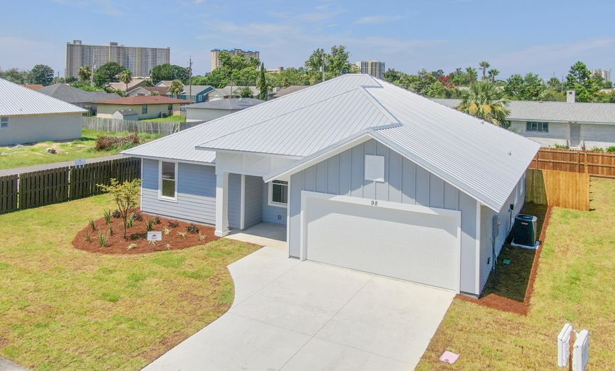 UNDER CONTRACT, ACCEPTING BACKUPS. Located on a private road, no HOA fees, extra parking for that boat or camper, 2 car garage, complete landscaping and irrigation, plus room for a pool! Interior features include 4 bedrooms, 2 baths, split floor plan, large windows, custom tile, beautiful floors, granite tops, stainless appliances, coastal designs, crown molding, tray ceilings plus check out the jetted tub in the gorgeous master bath! Pura Vida is located just a short stroll, bike ride or golf cart drive to the beach and fabulous Pier Park! Local builder provides a 10 year home warranty, professional home inspection and wind mitigation reports saving you money and ''peace of mind''.  There is currently a $15,000 price assistance on this home towards your downpayment and closing costs!!