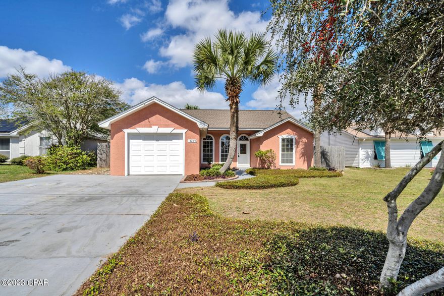 CURRENTLY UNDER CONTRACT, SELLER WILL CONSIDER BACKUP OFFERS. This beautiful beach house was just upgraded and is move in ready! South of 98 with a short walk and great access to the beach. Enjoy this open layout with perfect use of space. Great kitchen with stainless steel appliances and granite counter tops. Beautiful, large fenced in back yard with outdoor patios and shed. Small garage for golf cart and storage.