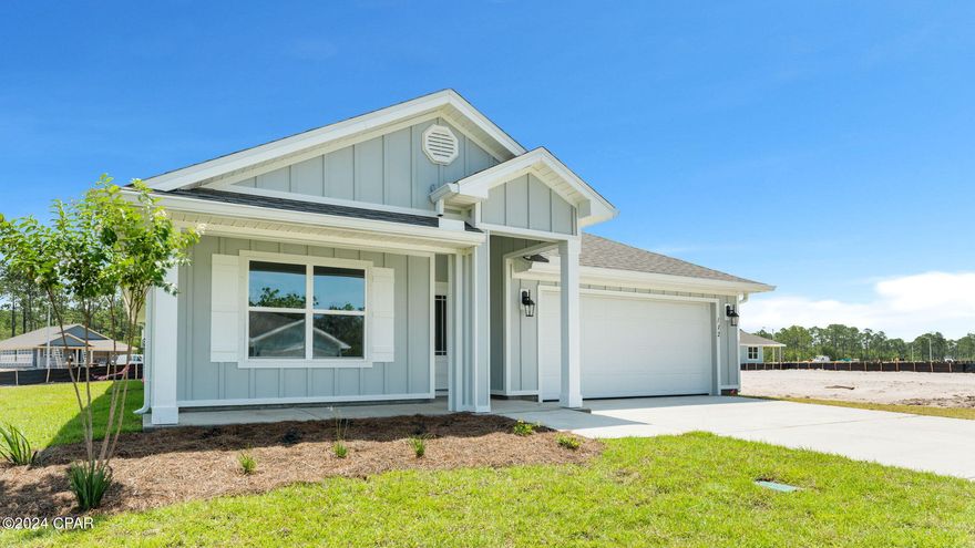 Come see our new home at 112 Cades Court located at Palmetto Bluff in Port St. Joe, Florida.  This home is situated on a large corner lot. As you enter this 4 bedroom, 2 bath Cali floor plan, you will see 1,799 square feet of spacious living. Inside you will see 8' ceilings throughout, engineered vinyl plank flooring throughout the home including the bedrooms. Beautiful granite countertops, white cabinetry and a spacious open living room and kitchen make this home perfect for having guests over. The kitchen has a large center island with cabinets underneath, ideal for serving food and extra storage. The kitchen also has a spacious pantry, and the stainless-steel appliances include smooth top range, microwave, and dishwasher.

The primary bedroom has soft carpet and its own bathroom featuring a spacious walk-in closet with ventilated shelving, a double vanity with granite countertops, and a separate shower and tub.

On the outside you will see the soft beach colors on each of the homes with durable Hardi Board around the home. The Cali features a covered rear patio to sit and enjoy the beautiful Florida weather. Each home in Palmetto Bluff has sidewalks that intertwine the community for you to enjoy your walks with the family during the gorgeous sunset views in Port St. Joe.
