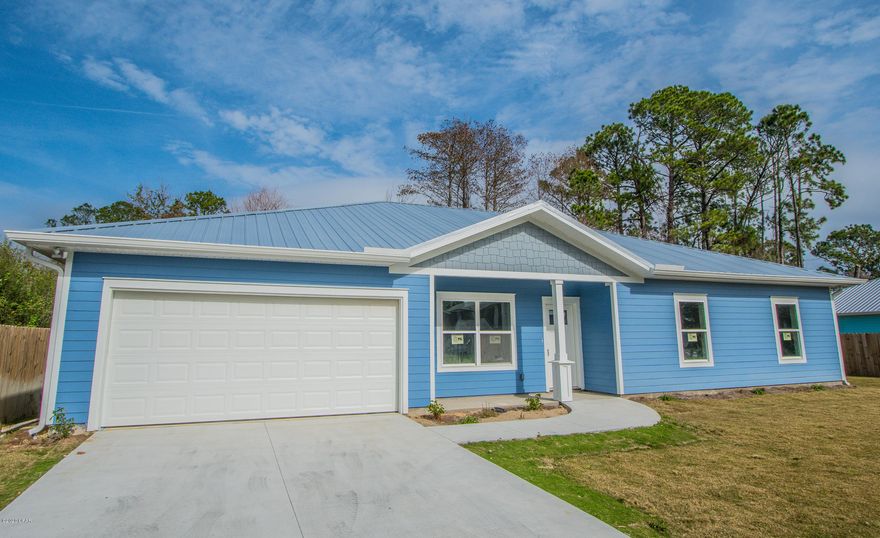 'CURRENTLY UNDER CONTRACT, SELLER ACCEPTING BACKUP OFFERS' NEW CONSTRUCTION! Corner lot located in the heart of Panama City Beach just minutes from the Navy Base, St. Andrews State Park and the world's most beautiful white sandy beaches. This craftsman style house has four bedroom two and a half bath. Living room with box ceiling, dining room and kitchen are open concept. Wood grain designer ceramic tile throughout the house. Master bedroom en-suite has double sinks, separate tub, shower and extra large walk-in closet. Spacious laundry room with sink. Granite counter tops with white shake style cabinets and stainless-steel appliances in the kitchen. Park your car in the 2-car enclosed garage. Fenced in yard with a back patio for grilling.