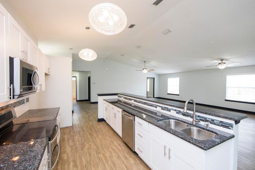 GREAT LOCATION!!! Just Painted this week! Large corner lot, spacious open floor plan, 3 bedroom 2 bath, updated kitchen, new paint, Walking distance to Pier Park shopping and dining. Homes in the area DO NOT last long, don't miss out.