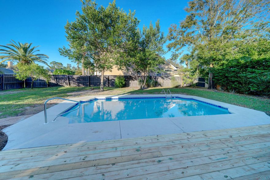 CURRENTLY UNDER CONTRACT, SELLER ACCEPTING BACKUP OFFERS' Move in ready home in popular Palm Bay in Panama City Beach! 3 bedrooms, 2 baths, oversized 2 car garage, and a pool! New paint, pool just resurfaced, granite  in the kitchen and updated baths! A great family home on a corner lot!  Palm Bay is a popular family neighborhood  in a great location,  close to Navy Base, St Andrew's State Park, grocery stores, restaurants, boating, the lagoon, the bay, and the beach!