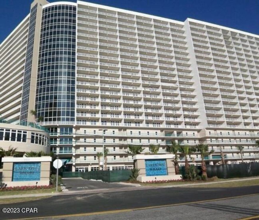 This 1 bedroom(with bunk room), 2 bathroom Laketown Wharf lake view unit is priced to sell, and can easily accommodate at least 6 comfortably. Seller's recent updates include USB plugs, new ceiling fans, dining room and entry room table, 2023 refrigerator, 2022 microwave, and 2021 dishwasher. Laketown Wharf is just steps away from our beautiful white sand beaches and offers everything you could want to enjoy your stay! 5 pools, children's funscape playground, gulf view fitness center, splash bar and grill, gulf fountain with nightly light shows, covered garage parking, as well as  restaurants and shops along the lake front boardwalk. All information is approximate and should be verified by buyers if important