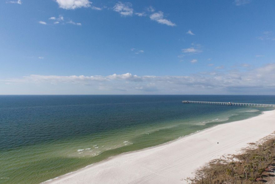 Lowest price Gulf front 3 bedroom unit in Grand Panama. Beautiful views of the Gulf of Mexico from this corner unit. You can see the Gulf from your bed in the master. You also have a wonderful view of the Gulf from the family room as well as the second bedroom. The view of the skyline looking east  of PCB at night is amazing. This condo has been a very successful rental for years. Grand Panama is a very popular destination in PCB. It is centrally located and easy to get in and out of because it has an entrance on both Front Beach Road as well as Middle Beach Road. There is a kiddie pool, hot tub and large pool gulf front. The exercise room is one of the largest on the beach. We have guest who request this condo every time they come to PCB. It is nicely furnished with stainless appliances.