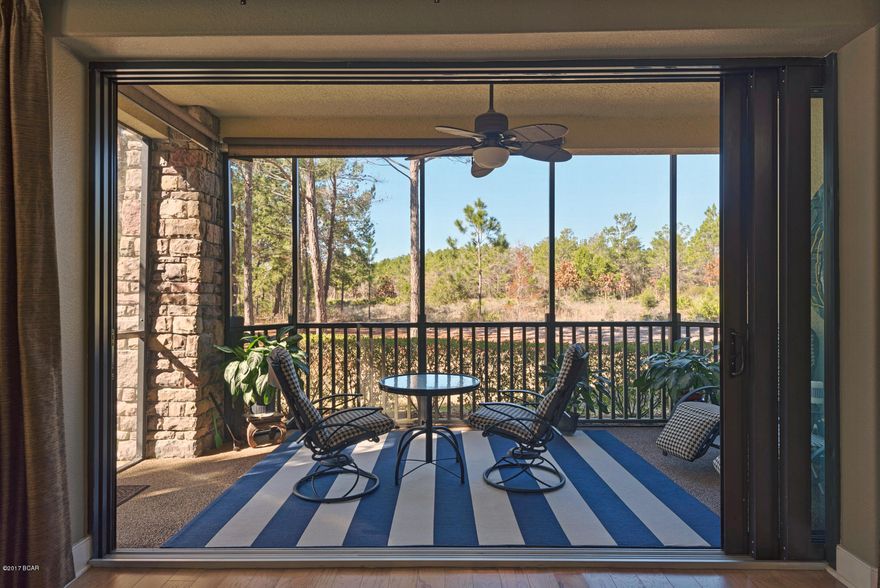 MOTIVATED SELLER! BELOW MARKET VALUE PRICE! Privacy awaits you in this beautiful golf course unit located on the 9th fairway of the world renowned Greg Norman Shark's Tooth Golf Course.  All on ONE LEVEL and laid out perfect for entertaining with a spacious floor plan.   Stackable glass doors extend along the back of the Living Area fully opening to a screened patio protected from the morning and evening sun.  The large Master Suite features a bay window niche, spacious closets, jetted tub, separate shower and double vanities.  The second bedroom and bath may be closed off to create another mini suite. Indoor storage room leading to DOUBLE GARAGE could also easily be used for an office, bunk or play room.  From the minute you enter this amazing GATED COMMUNITY with 24 HOURS SECURITY, you w feel the relaxed resort atmosphere that captures the hearts of all those who call this home!  Wild Heron is a sanctuary of 734 acres of natural preserve on the largest coastal dune lake in Florida.  Amenities include a state of the art fitness center, large pool with fenced children's area, boat house with kayaks & canoes, picnic pavilion with fireplace and grilling area, fire pit, ark with moss filled oak trees, gazebo and playground, and numerous walking trails through out.  GOLF, TENNIS AND BEACHCLUB MEMBERSHIP available for purchase separately.  If you want to enjoy nature at it's best you will not want to miss this incredible opportunity!